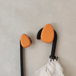 Orange wall mounted coat racks