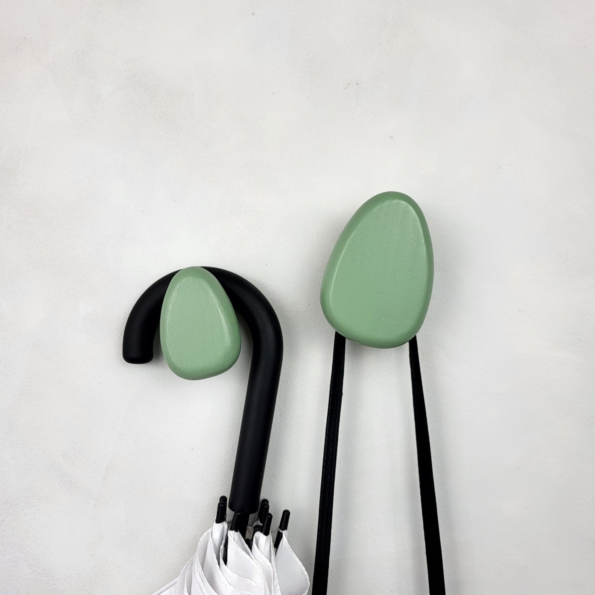 Sage green wall mounted hooks