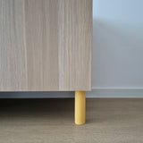 yellow cabinet leg