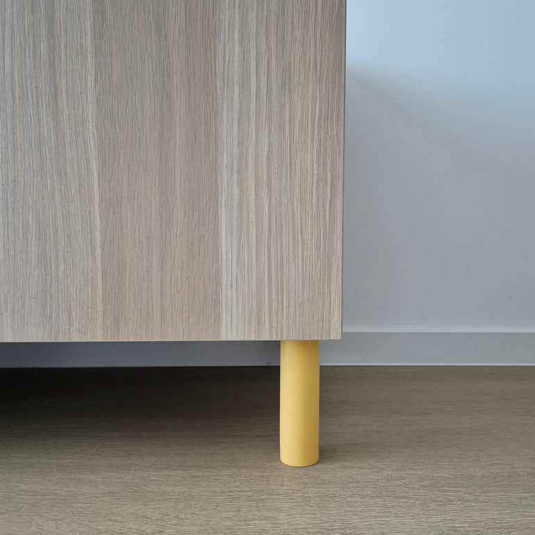 yellow cabinet leg