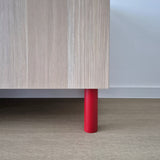 red cabinet legs