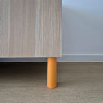 orange cabinet leg