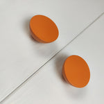 Modern bright orange knobs