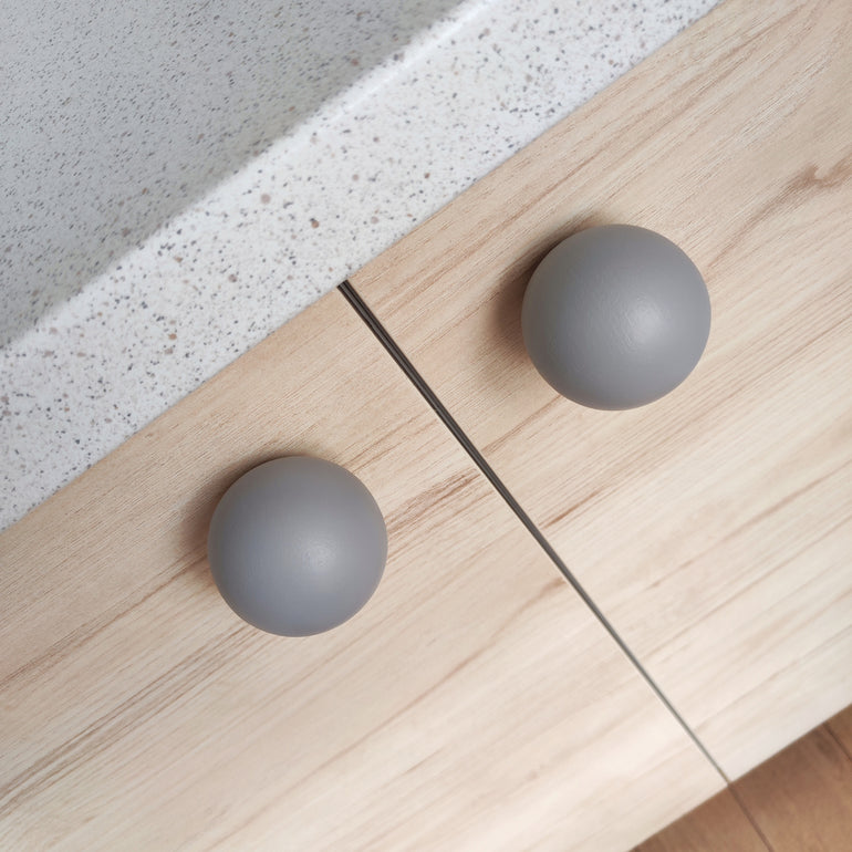 Grey knobs for kitchen furniture