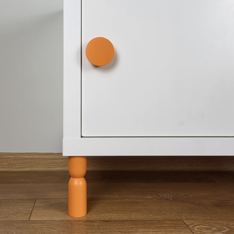 orange cabinet legs and knob