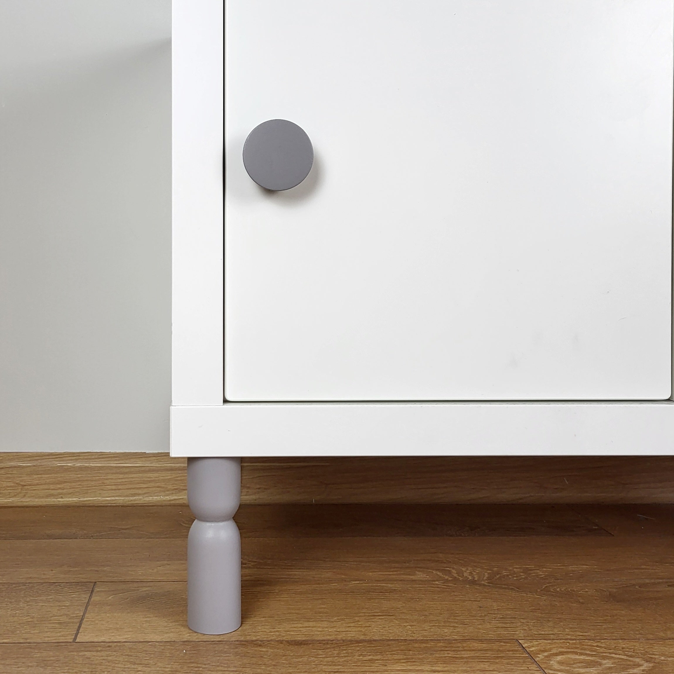 gray cabinet leg and knob