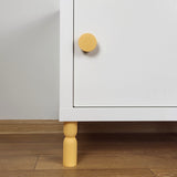 yellow cabinet leg and yellow knob