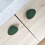 Dark green knobs for kitchen furniture