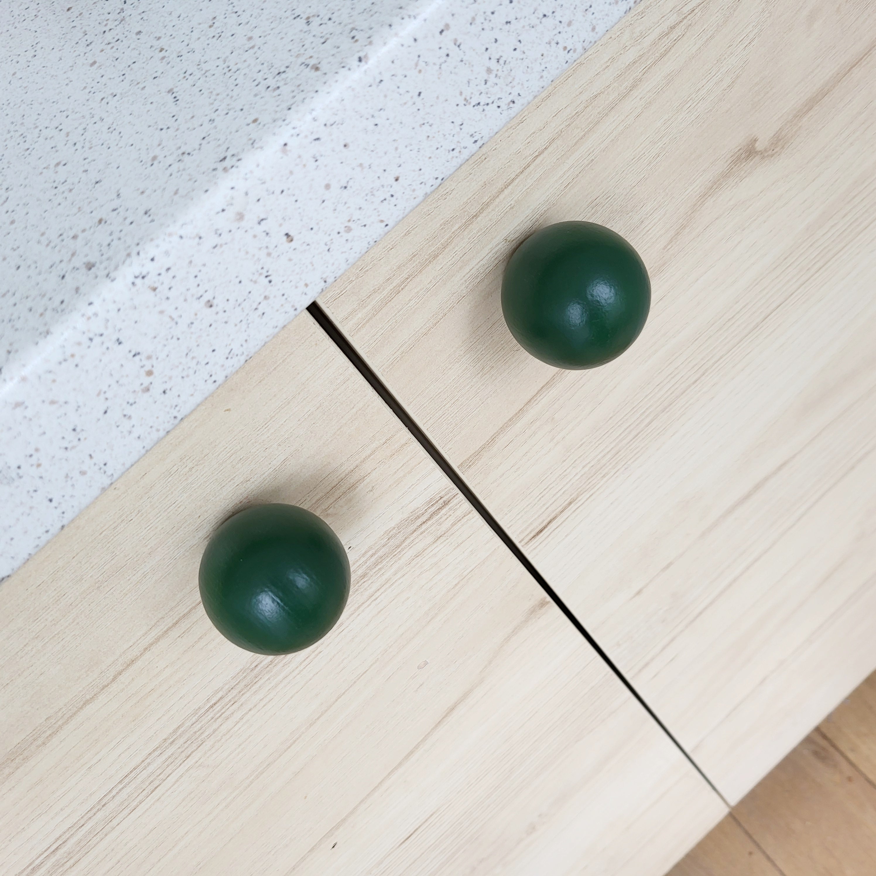 Dark green knobs for furniture