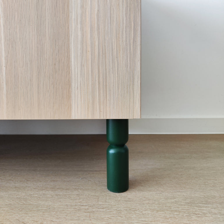 dark green furniture leg