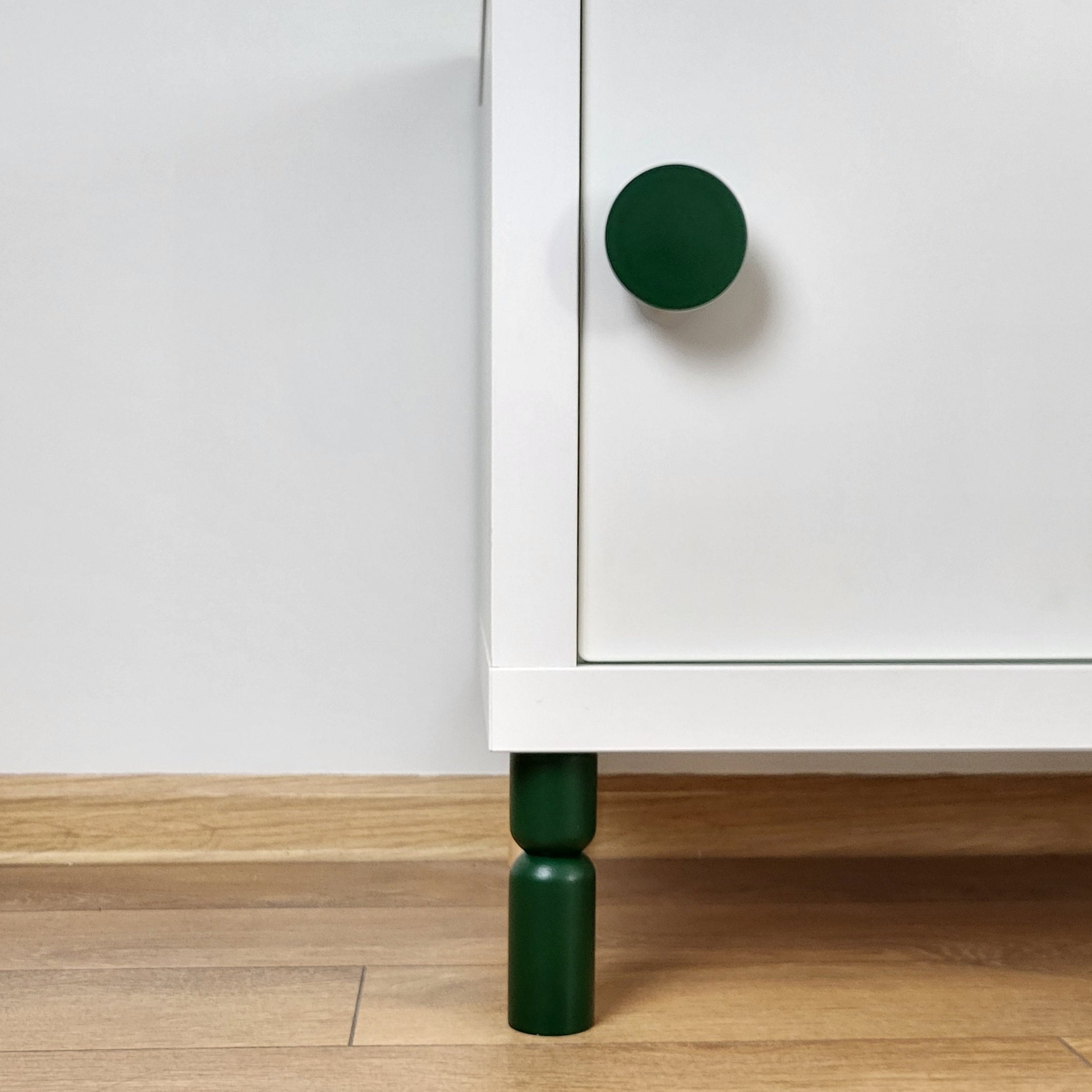 dark green cabinet legs and knob