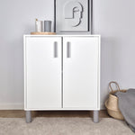 Grey cabinet handle on modern white cabinet, enhancing minimalist interior decor.