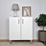 Beige cabinet handles with legs on IKEA Eket