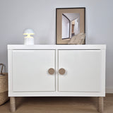 White cabinet with beige round knobs