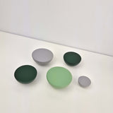 Grey and green round knobs