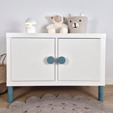 White cabinet with turquoise round knobs and legs
