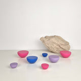 Pink, purple and blue round knobs