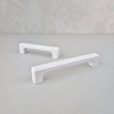 White cabinet handles