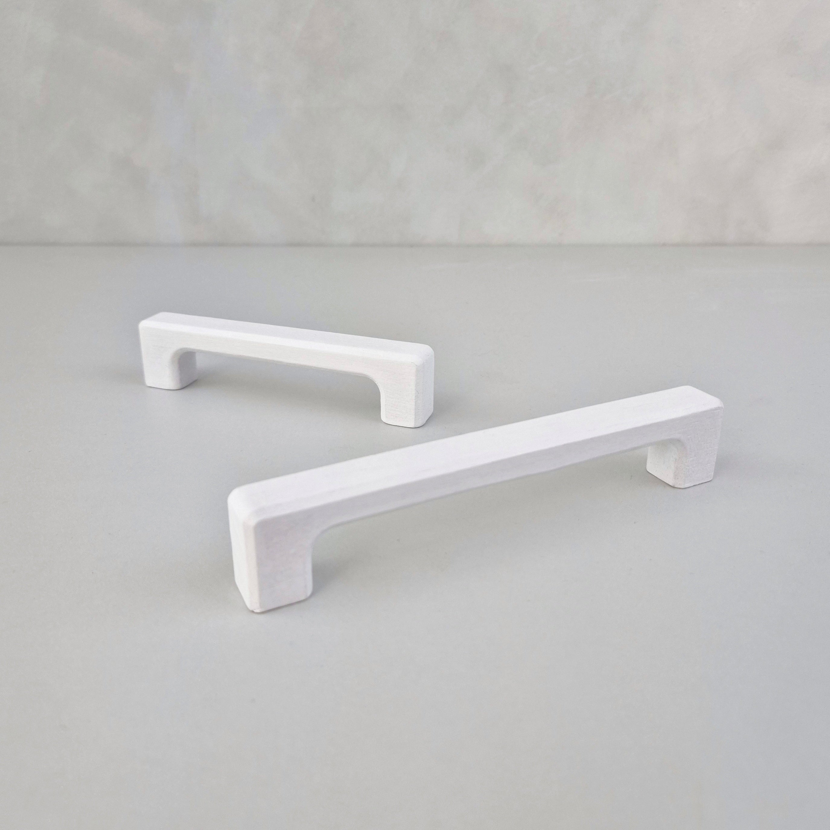 White cabinet handles
