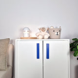 White cabinet with blue L-Shaped Furniture Handles