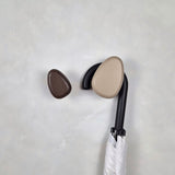 Brown wall hook with umbrella
