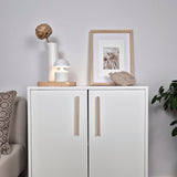 White cabinet with long wooden handles