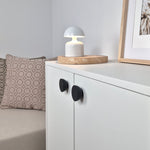 Flat round knob BALANCE on IKEA white cabinet