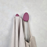 Plum wall hooks with towel and bag