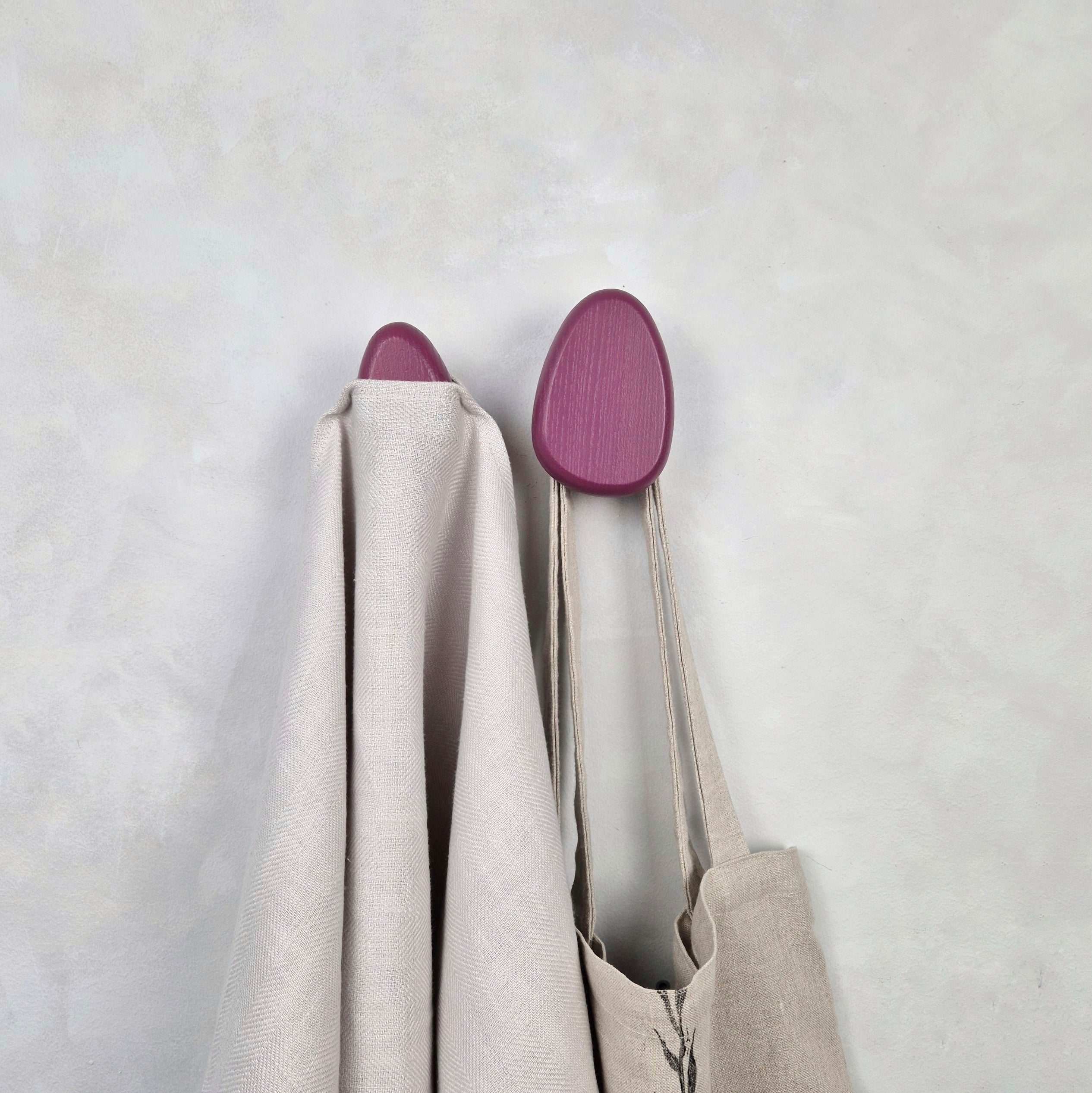 Plum wall hooks with towel and bag