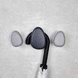 Light and dark grey wall hooks