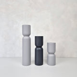 Decorative hourglass shaped furniture legs in gray tones, perfect for enhancing IKEA Kallax and Besta furniture.