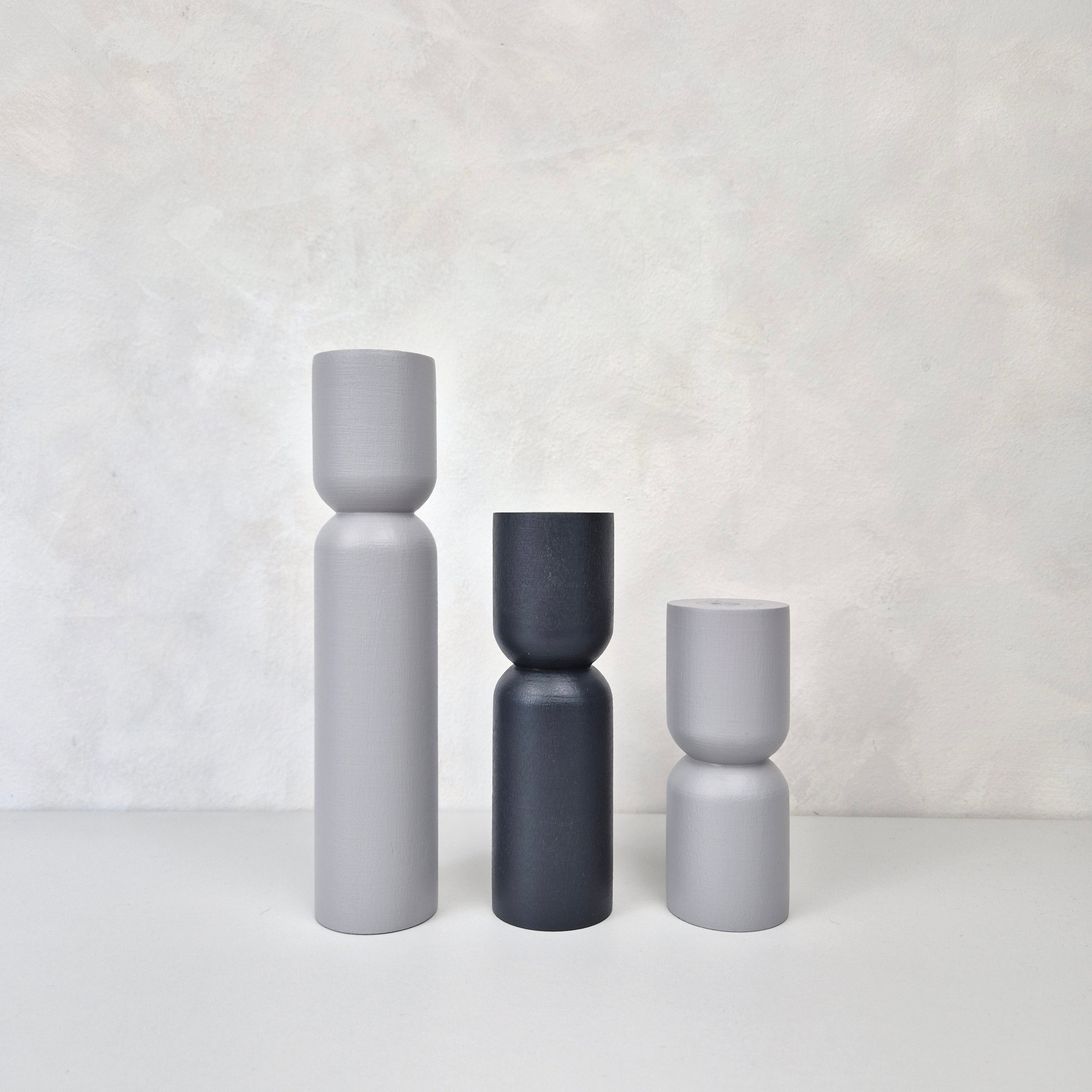 Decorative hourglass shaped furniture legs in gray tones, perfect for enhancing IKEA Kallax and Besta furniture.