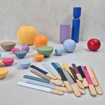 NAMII Paint Sample Set featuring colorful wooden sticks and various geometric shapes.