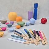 NAMII Paint Sample Set featuring colorful wooden sticks and various geometric shapes.