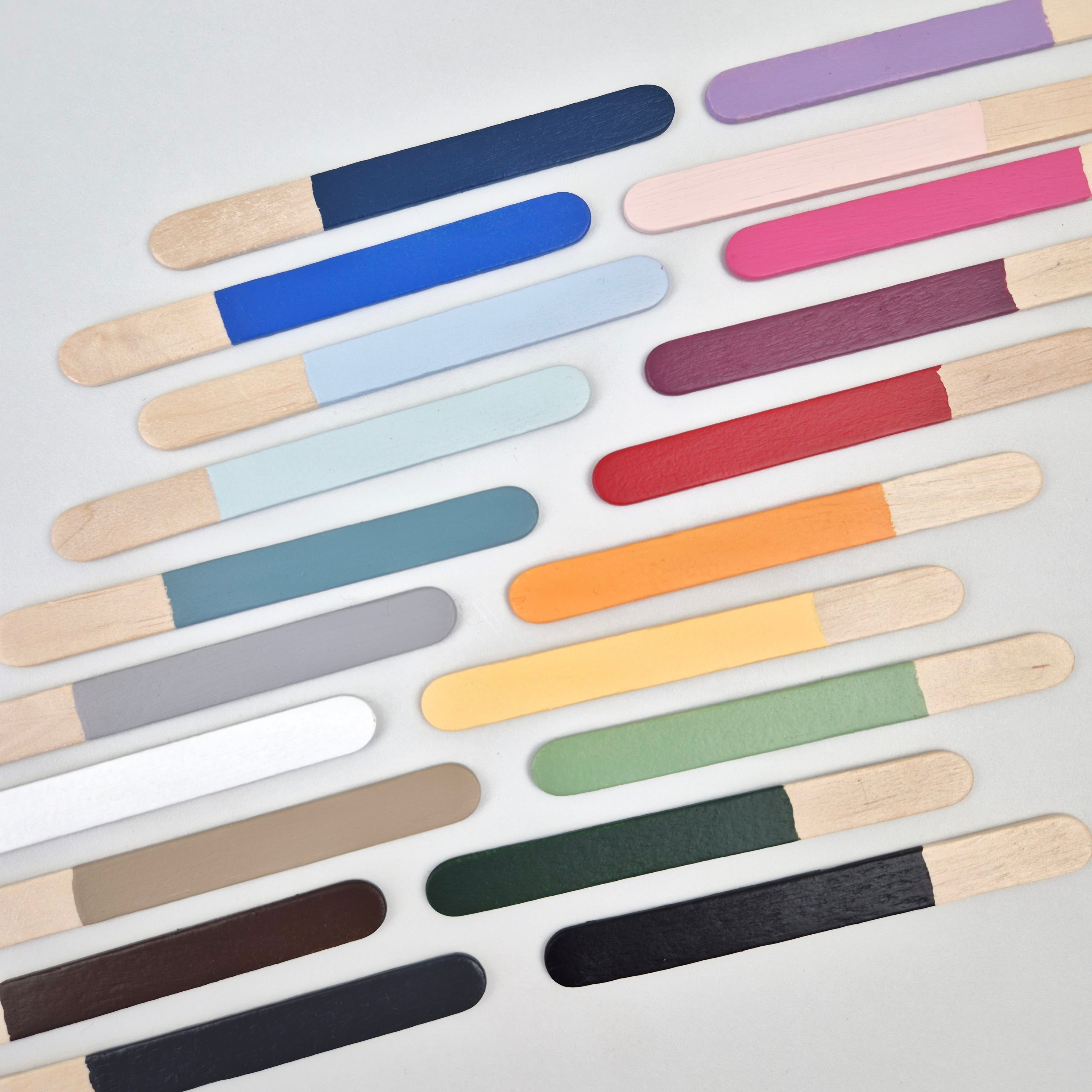 NAMII Paint Sample Set featuring a variety of hand-painted wooden color sample sticks in different shades.