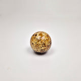 Round knob AMBER made from pressed amber with a smooth, rounded design, adding elegance to any furniture.