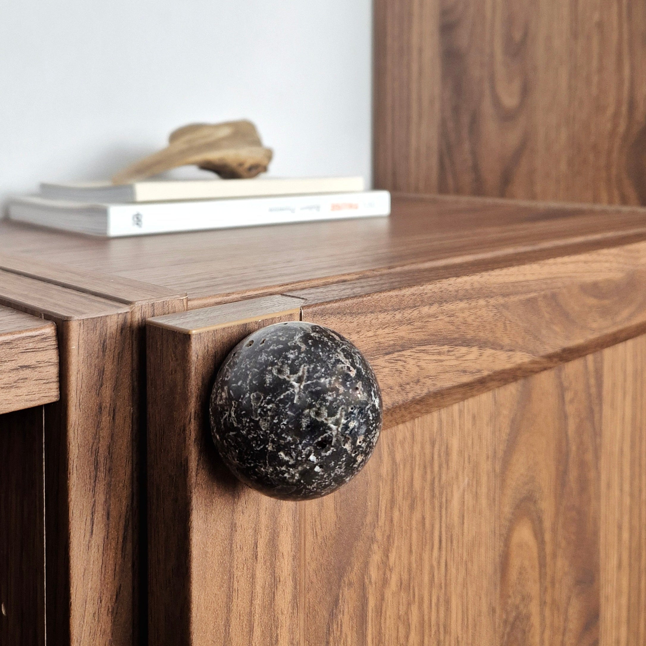 Travertine Cabinet Knob on a wooden cabinet, showcasing natural stone design and unique textures.