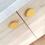Bright yellow knobs for kids room furniture
