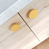 Bright yellow knobs for kids room furniture