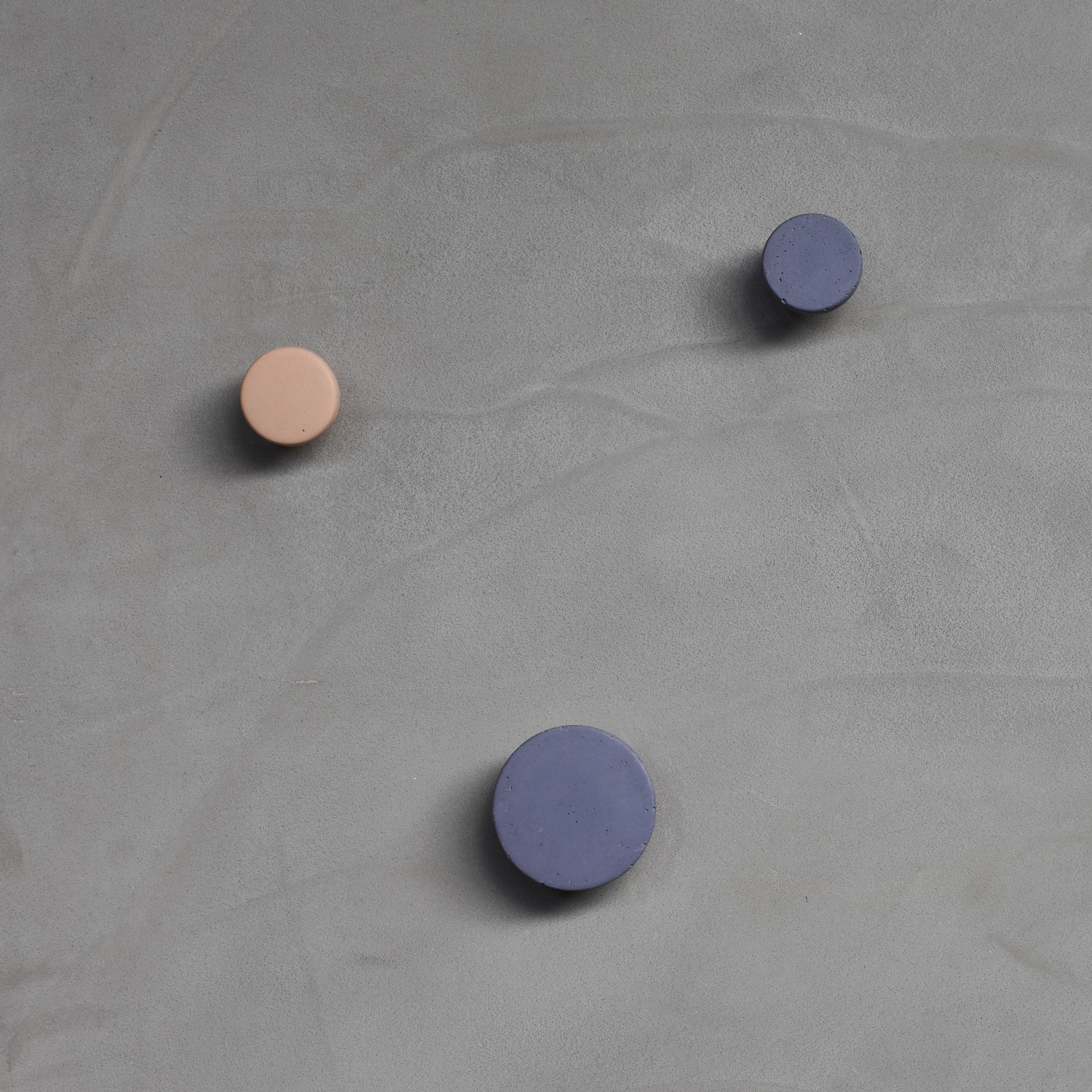 Concrete purple wall hooks