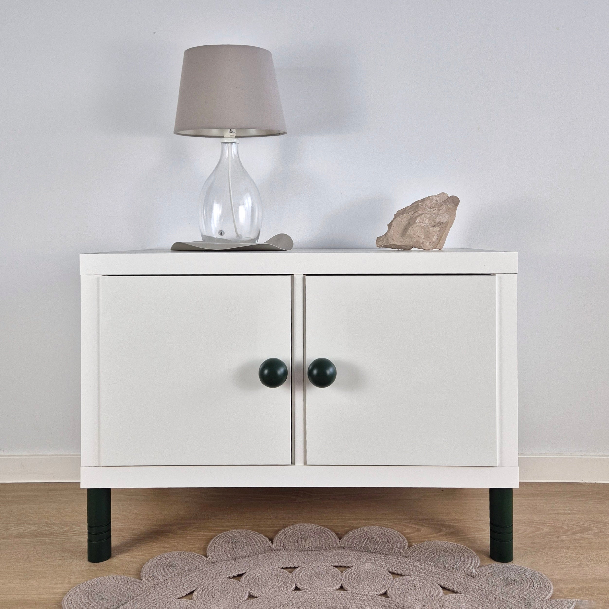 White cabinet with Round dark green knobs BALANCE