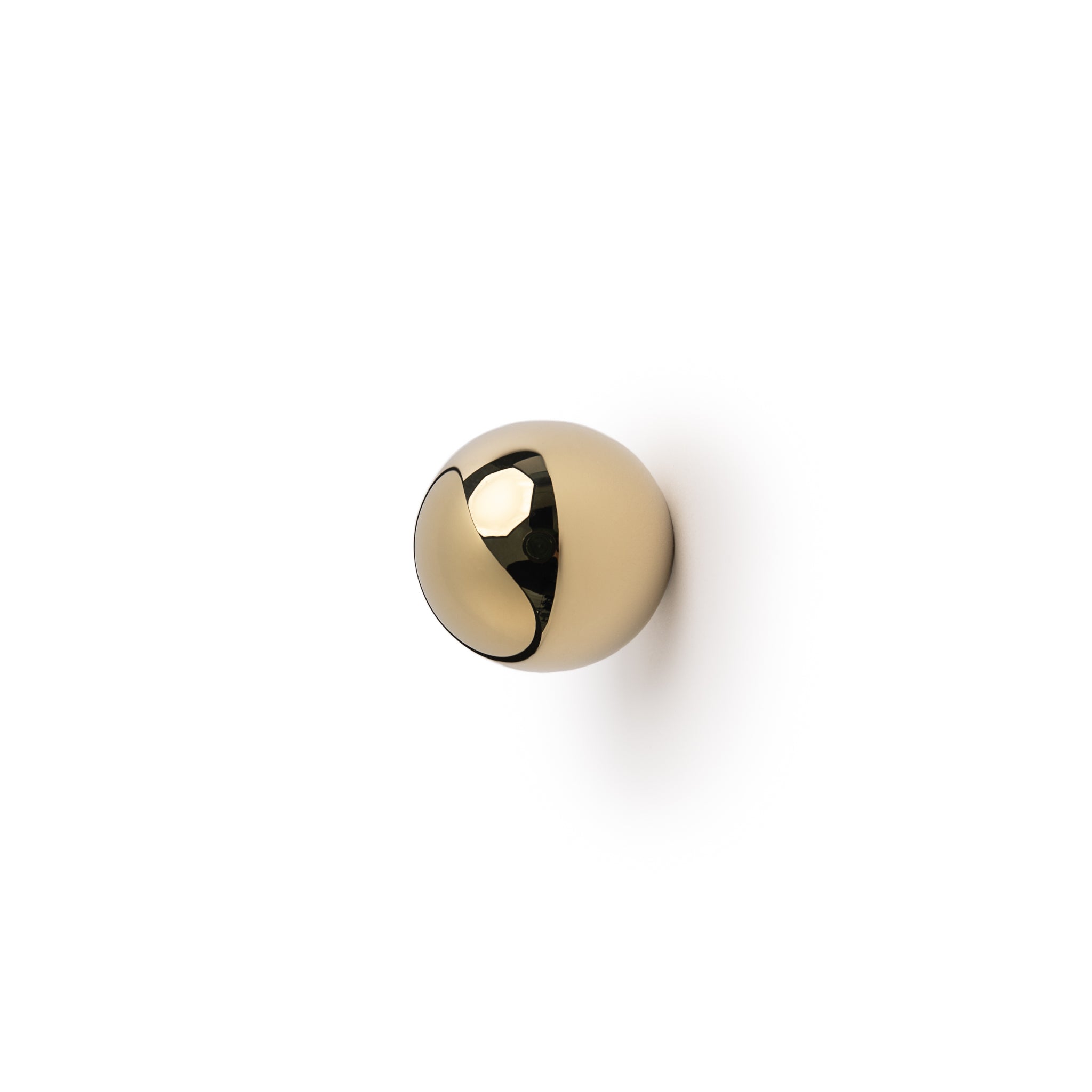 glossy brass knob