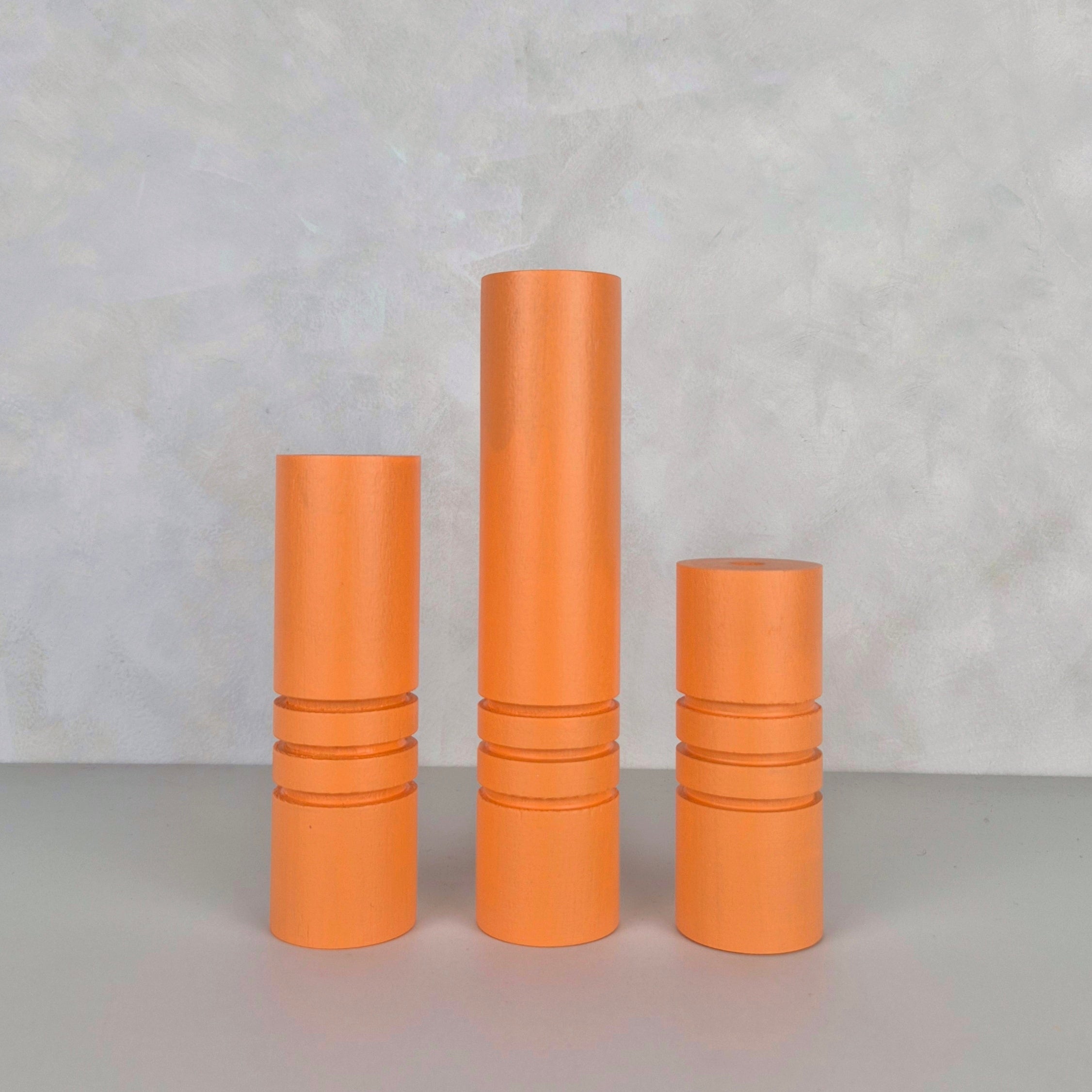 Striped orange Ball furniture legs in three sizes, perfect for bedside tables and cabinets.