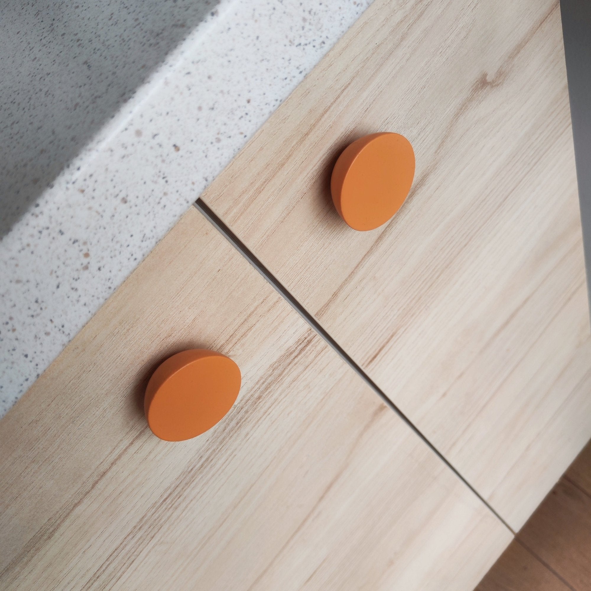 Orange knobs for kids room furniture