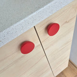 Playful red knobs for children room furniture