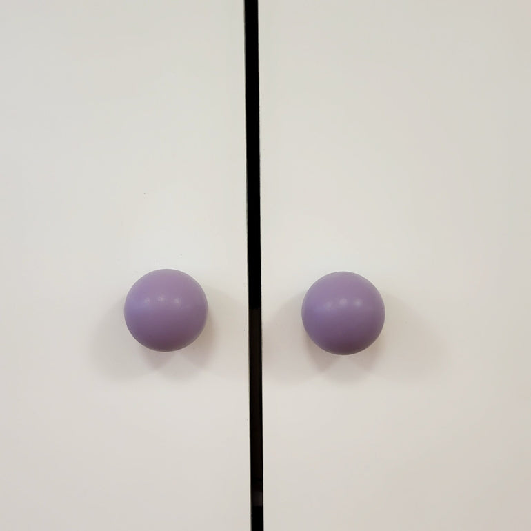 Purple knobs for white furniture