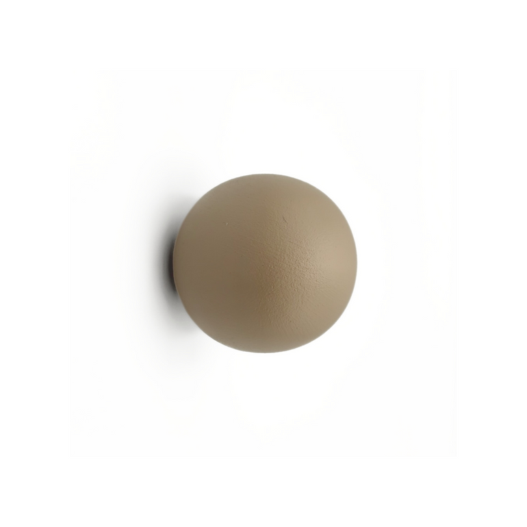 Round beige knob