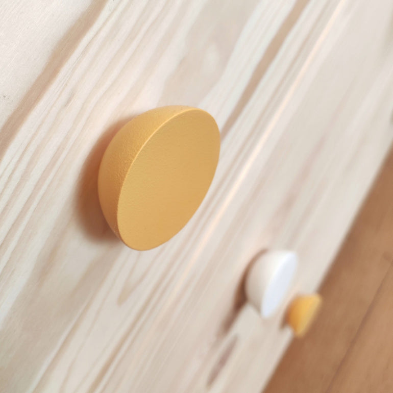 Yellow knobs for IKEA drawers 