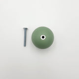 green knob with screw