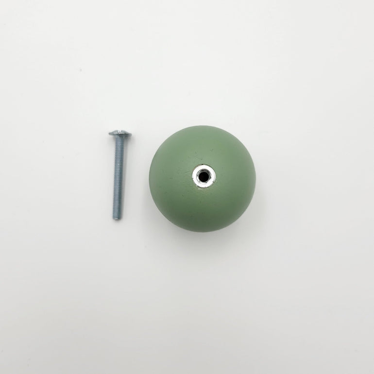 green knob with screw